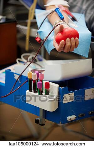 Person donating blood, cropped View Large Photo Image Picture - Person donating blood, cropped. Fotosearch