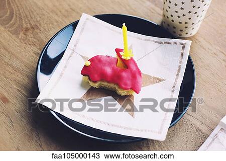 Small cake with birthday candle View Large Photo Image Stock Image - Small cake with birthday candle. Fotosearch