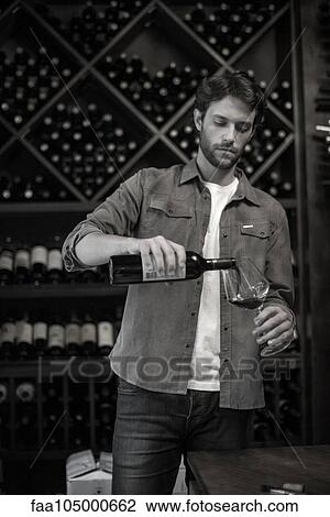 Sommelier pouring glass of wine View Large Photo Image Stock Image - Sommelier pouring glass of wine. Fotosearch
