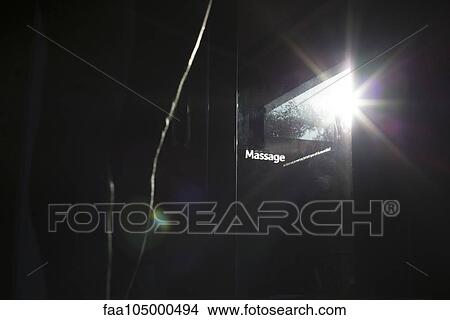 Picture - Sunlight shining through glass door in health spa. Fotosearch