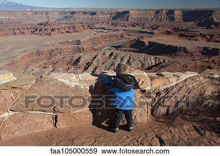 Toddler boy looking at scenic view at Dead Horse Point State Park in Utah, USA View Large Photo Image Stock Photo - Toddler boy looking at scenic view at Dead Horse Point State Park in Utah, USA. Fotosearch