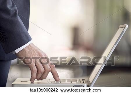 Using laptop computer View Large Photo Image Stock Image - Using laptop computer. Fotosearch