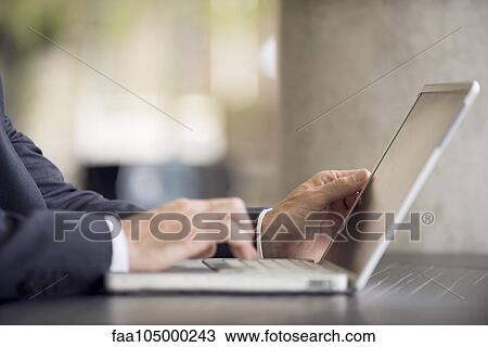 Using laptop computer View Large Photo Image Stock Image - Using laptop computer. Fotosearch