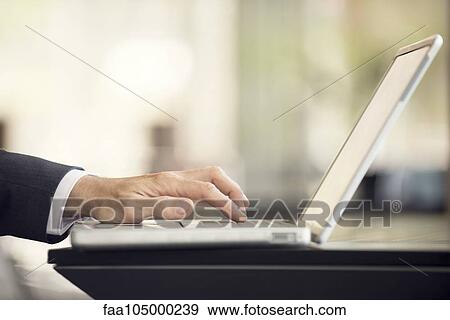 Using laptop computer View Large Photo Image Stock Photo - Using laptop computer. Fotosearch