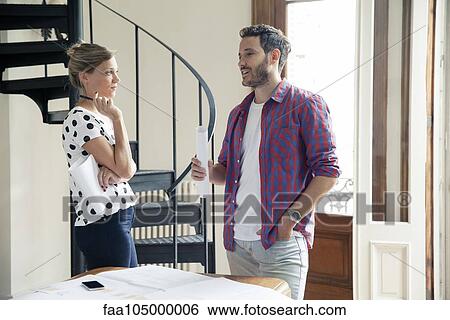 Wife and husband discussing home improvement plans View Large Photo Image Stock Photograph - Wife and husband discussing home improvement plans. Fotosearch