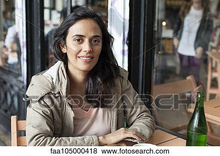 Woman at cafe View Large Photo Image Stock Photo - Woman at cafe. Fotosearch