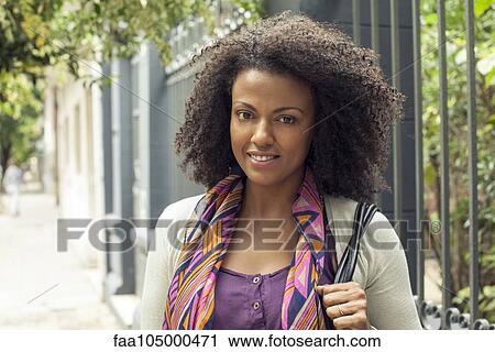 Woman with curly hair, portrait View Large Photo Image Stock Image - Woman with curly hair, portrait. Fotosearch
