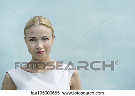 Young woman smiling, portrait View Large Photo Image Stock Photography - Young woman smiling, portrait. Fotosearch