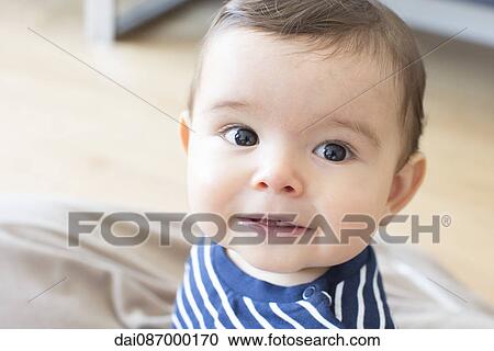Baby smiling, portrait View Large Photo Image Stock Image - Baby smiling, portrait. Fotosearch