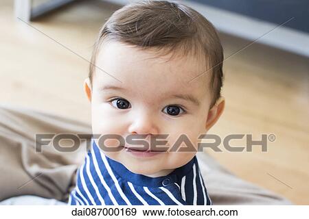 Baby smiling, portrait View Large Photo Image Stock Photo - Baby smiling, portrait. Fotosearch