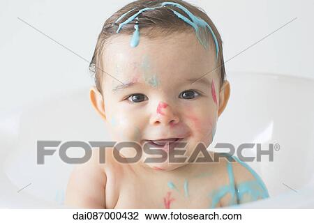Baby splattered in colorful soap at bathtime View Large Photo Image Stock Image - Baby splattered in colorful soap at bathtime. Fotosearch