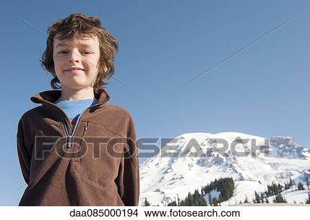 Picture - Boy at Mount Rainier National Park, Washington, USA. Fotosearch