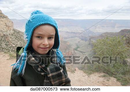 Stock Image - Boy at the Grand Canyon, Arizona, USA. Fotosearch