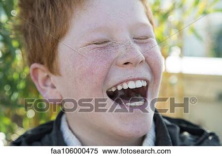 Boy laughing with eyes closed, portrait View Large Photo Image Stock Photography - Boy laughing with eyes closed, portrait. Fotosearch