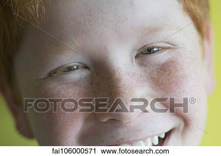 Boy smiling cheerfully, portrait View Large Photo Image Stock Image - Boy smiling cheerfully, portrait. Fotosearch