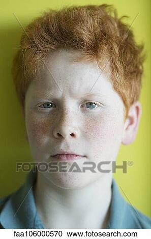Boy with red hair furrowing brow, portrait View Large Photo Image Stock Image - Boy with red hair furrowing brow, portrait. Fotosearch