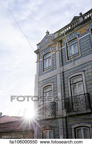 Building with ornate tiled facade View Large Photo Image Stock Image - Building with ornate tiled facade. Fotosearch