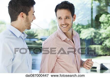 Business colleagues chatting View Large Photo Image Stock Photo - Business colleagues chatting. Fotosearch