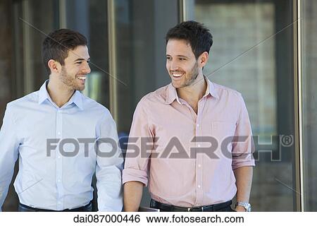 Business colleagues chatting View Large Photo Image Stock Photograph - Business colleagues chatting. Fotosearch
