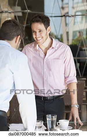 Business partners meeting for lunch View Large Photo Image Stock Photography - Business partners meeting for lunch. Fotosearch