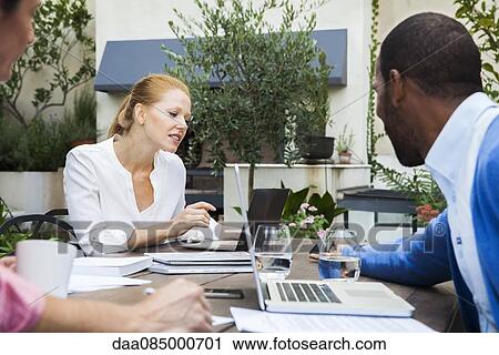 Business professionals meeting by conference call View Large Photo Image Stock Image - Business professionals meeting by conference call. Fotosearch