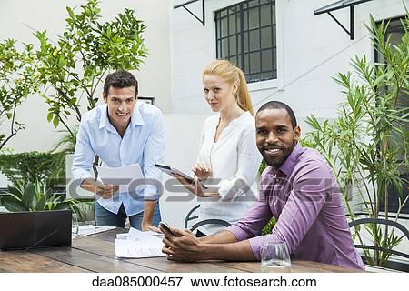 Business team at work, portrait View Large Photo Image Stock Photo - Business team at work, portrait. Fotosearch