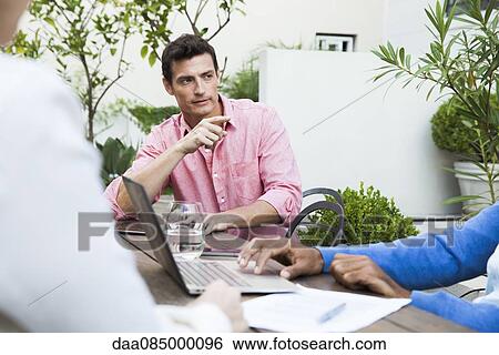 Business team brainstorming session View Large Photo Image Stock Photograph - Business team brainstorming session. Fotosearch