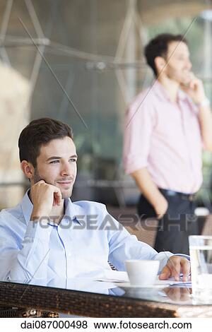 Businessman enjoying coffee break View Large Photo Image Stock Photo - Businessman enjoying coffee break. Fotosearch