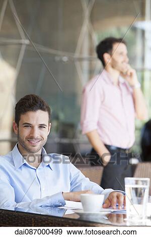 Businessman enjoying coffee break, portrait View Large Photo Image Stock Photo - Businessman enjoying coffee break, portrait. Fotosearch