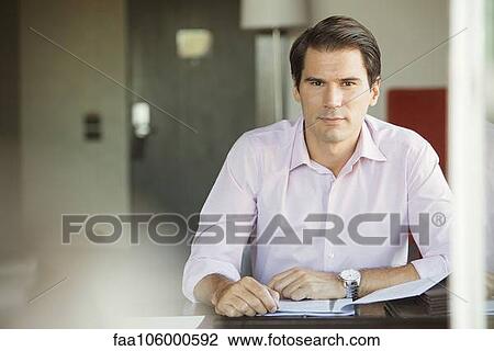 Businessman in office, portrait View Large Photo Image Stock Image - Businessman in office, portrait. Fotosearch