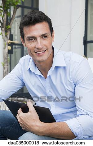 Stock Photo - Businessman, portrait. Fotosearch