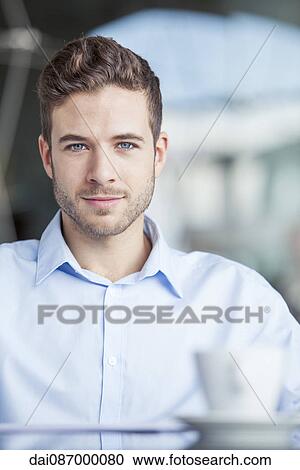 Businessman taking coffee break View Large Photo Image Stock Image - Businessman taking coffee break. Fotosearch