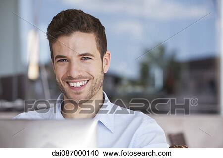 Businessman using laptop computer View Large Photo Image Stock Image - Businessman using laptop computer. Fotosearch
