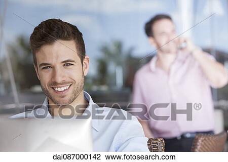 Businessman using laptop computer View Large Photo Image Stock Image - Businessman using laptop computer. Fotosearch