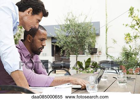 Businessmen collaborating View Large Photo Image Stock Photography - Businessmen collaborating. Fotosearch