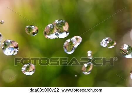 Stock Image - Close-up of water droplets. Fotosearch