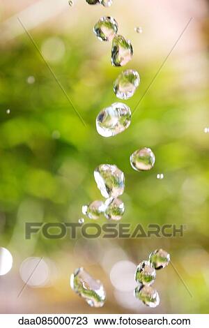 Stock Image - Close-up of water droplets. Fotosearch