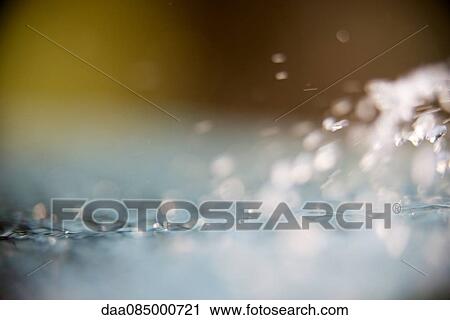 Stock Image - Close-up of water splashing. Fotosearch