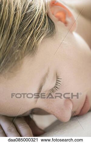Stock Image - Close-up of woman's face. Fotosearch