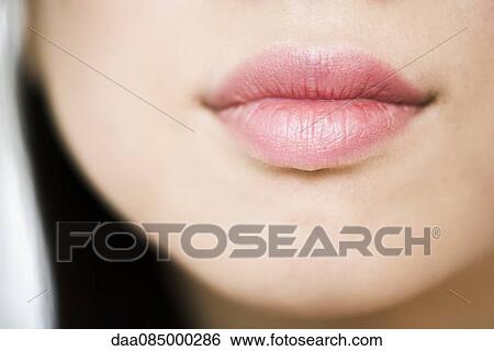 Stock Photograph - Close-up of woman's lips. Fotosearch