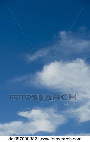 Clouds in blue sky View Large Photo Image Stock Image - Clouds in blue sky. Fotosearch