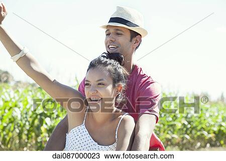 Stock Image - Couple enjoying day outdoors together. Fotosearch