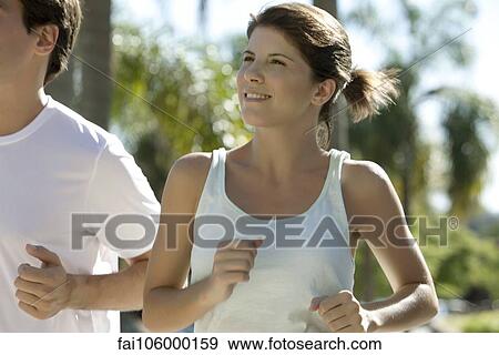 Couple jogging together View Large Photo Image Stock Photo - Couple jogging together. Fotosearch