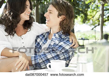 Couple spending time together outdoors View Large Photo Image Stock Photo - Couple spending time together outdoors. Fotosearch