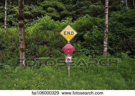 Dead end sign posted at edge of woods View Large Photo Image Stock Photo - Dead end sign posted at edge of woods. Fotosearch