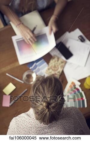 Design team members consider color options for project View Large Photo Image Stock Photography - Design team members consider color options for project. Fotosearch