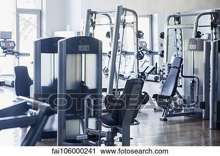 Empty weight room in health club View Large Photo Image Stock Image - Empty weight room in health club. Fotosearch