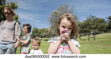 Family spending day outdoors View Large Photo Image Stock Image - Family spending day outdoors. Fotosearch