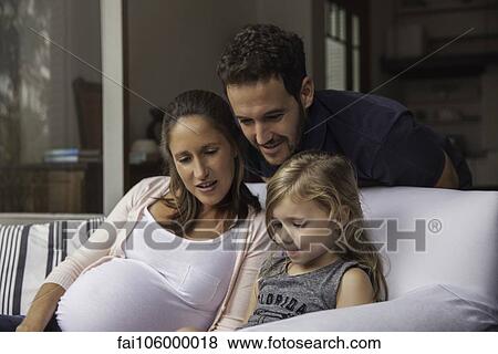 Family spending time together at home View Large Photo Image Stock Photo - Family spending time together at home. Fotosearch