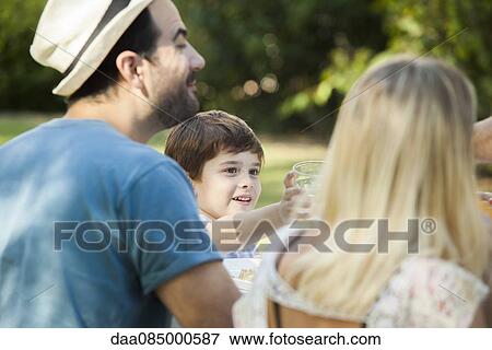 Family with young boy View Large Photo Image Stock Photo - Family with young boy. Fotosearch